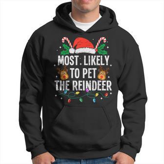 Most Likely To Pet The Reindeer Christmas Xmas Hoodie - Thegiftio UK