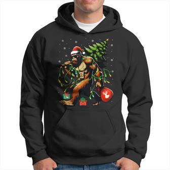 Santa Bigfoot Christmas Tree Xmas Lights Sasquatch Hoodie - Thegiftio UK