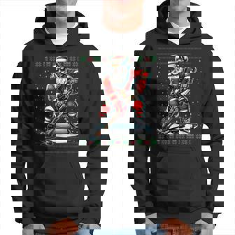 Santa Claus Playing Hockey Ugly Christmas Sweater Hoodie - Seseable