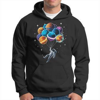 Space Astronaut Holding Planet Balloons Space Hoodie - Thegiftio UK