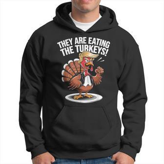 They Are Eating The Turkeys Thanksgiving Turkey Trump Hoodie - Thegiftio UK