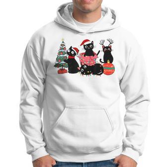 Meowy Christmas Black Cats Play Christmas Tree Lights Cats Hoodie - Thegiftio UK