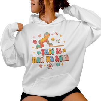 Montessori Teacher Groovy Back To School This Is How We Roll Women Hoodie - Thegiftio UK