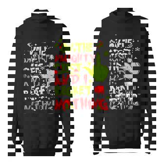 On The Naughty List And I Regret Nothing Christmas Pajamas Sweatshirt - Monsterry
