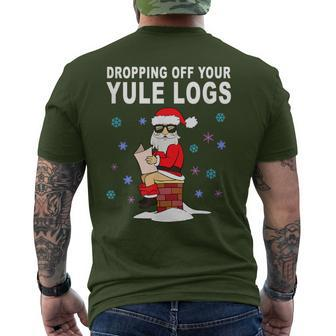 Santa Dropping Off Yule Logs Christmas Men's T-shirt Back Print - Monsterry DE