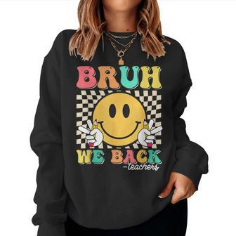 Bruh We Back Teachers Retro Smile Face Groovy Back To School Women Sweatshirt - Monsterry CA