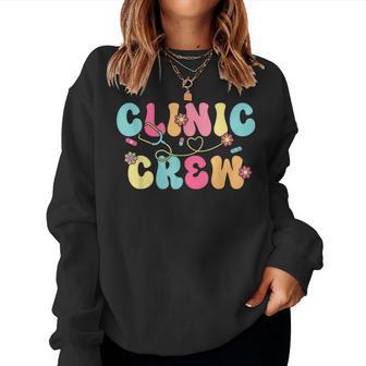 Clinic Crew For School Nurse Groovy On Back Women Sweatshirt - Thegiftio UK