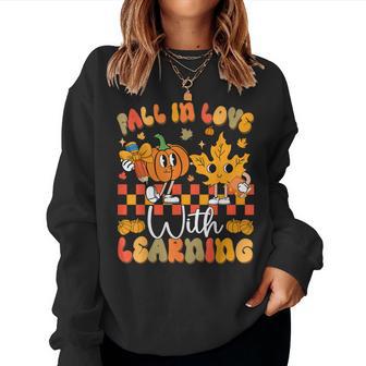Fall In Love With Learning Teacher Autumn Pumpkin Women Sweatshirt - Thegiftio UK