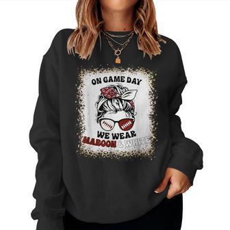 On Gameday Football We Wear Maroon And White Messy Bun Hair Women Sweatshirt - Thegiftio UK