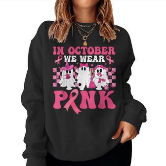 Groovy In October We Wear Pink Halloween Ghost Breast Cancer Women Sweatshirt - Thegiftio UK