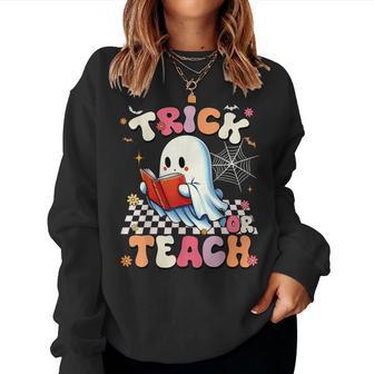 Groovy Teacher Halloween Retro Trick Or Teach Floral Ghost Women Sweatshirt - Thegiftio UK