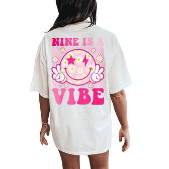 Nine Is A Vibe 9Th Birthday Groovy 9 Years Old Smile Face Women's Oversized Comfort T-Shirt Back Print - Thegiftio UK