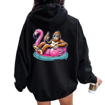 Bigfoot Chilling On Flamingo Float With Beer Fun Summer Vibe Women Oversized Hoodie Back Print - Monsterry UK