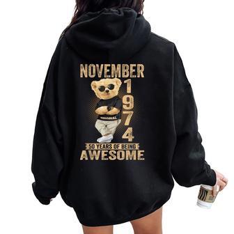 November 50Th Birthday 1974 Awesome Teddy Bear Women Oversized Hoodie Back Print - Thegiftio UK