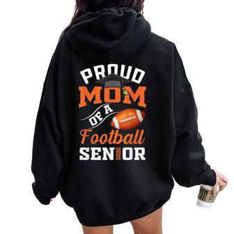 Proud Mom Of A Football Senior Class Of 2025 Graduation Women Oversized Hoodie Back Print - Thegiftio UK