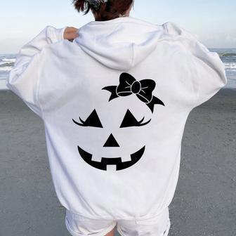 Fun Jack O Lantern Pumpkin Face Eyelashes Bow Halloween Girl Women Oversized Hoodie Back Print - Thegiftio UK
