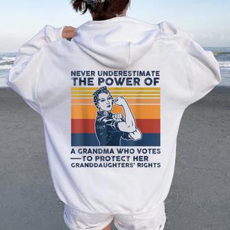 Never Underestimate The Power Of A Grandma Who Votes Women Oversized Hoodie Back Print - Thegiftio UK