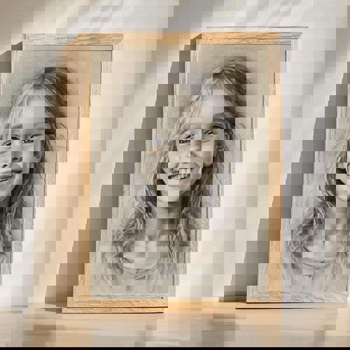 Daughter charcoal portrait artwork, hand-drawn in monochrome with soft shading; gift for parents, vertical on white paper | Familywalldecor