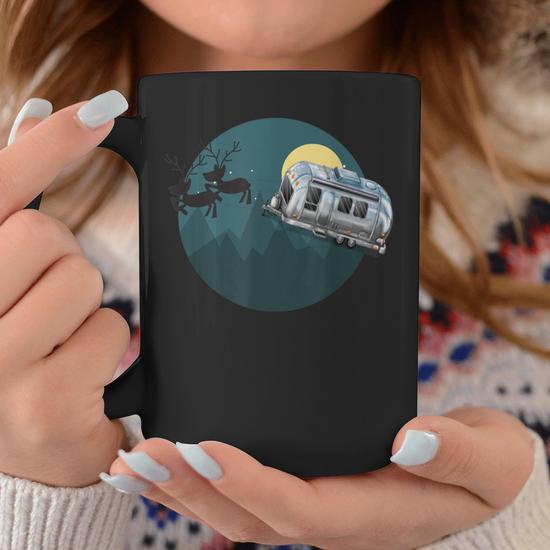 A Vintage Airstream Trailer Being Pulled By Reindeer Coffee Mug - Monsterry