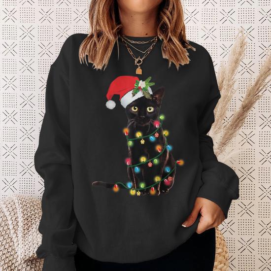Sweat à Capuche Père Noël Chat Noir Emmêlé Dans Les Lumières De Noël – Cadeau Fun Pour Amoureux Des Chats