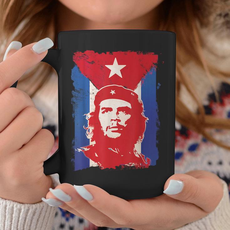 Painting of Che Guevara and Cuban flag on a wall, Havana, Cuba, West