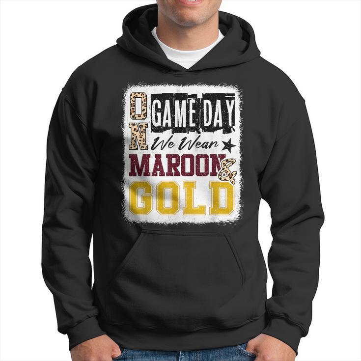 Maroon and gold hoodie best sale