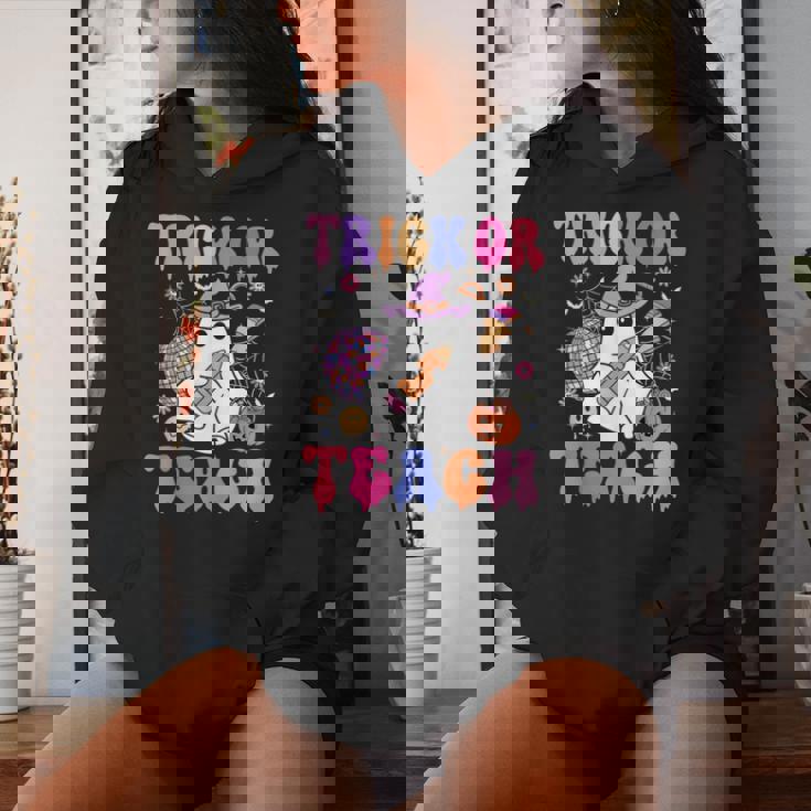Trick Or Teach Groovy Halloween Floral Ghost Teacher Women Hoodie Gifts for Her