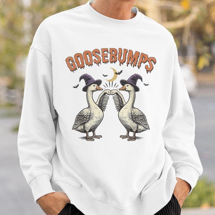 Goose Bumps Goosebumps Geese Fist Bump Pun Sweatshirt - Monsterry