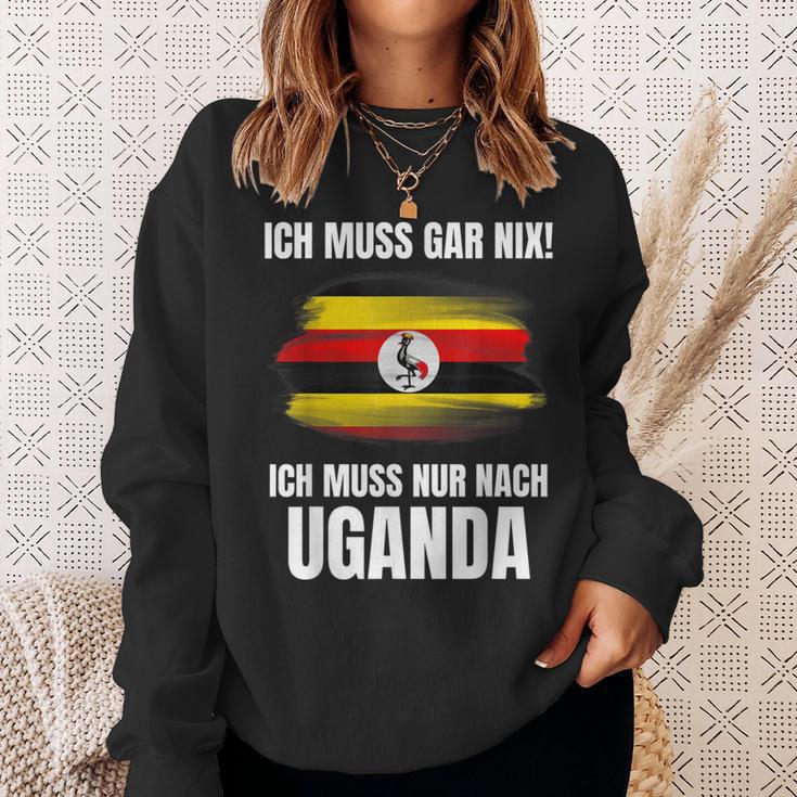 Ich Muss Gar Nix Ich Muss Nur Nach Uganda Sweatshirt Geschenke für Sie