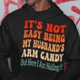 It's Not Easy Being My Husband's Arm Candy But Here I Am Hoodie Unique Gifts
