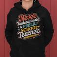 Groovy Never Underestimate A Public School Teacher Women Women Hoodie