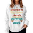 Retro Leveling Up To Big Sister 2025 Baby Announcement Women Sweatshirt