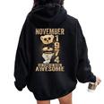 November 50Th Birthday 1974 Awesome Teddy Bear Women Oversized Hoodie Back Print Black