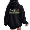 Wildflower Best Teacher Outfits Let's Grow Together Women Oversized Hoodie Back Print Black