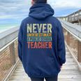 Retro Never Underestimate A Public School Teacher Women Oversized Hoodie Back Print Navy Blue