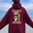 November 50Th Birthday 1974 Awesome Teddy Bear Women Oversized Hoodie Back Print Maroon