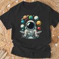 Divertido Astronauta Espacial Malabares Sistema Solar Planetas Niños Camiseta unisex Regalos para ancianos